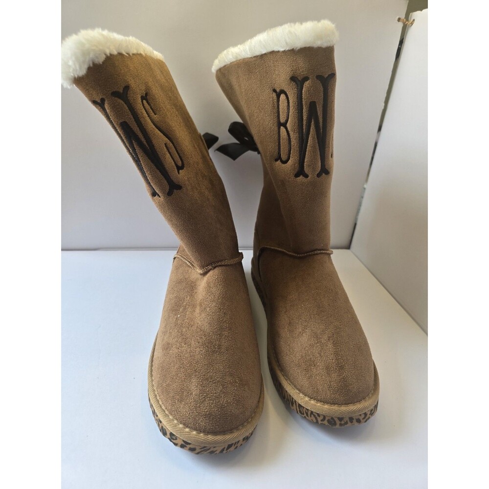 Beautiful Marleylilly Boots. Cute ties in back. Never worn. Size 12